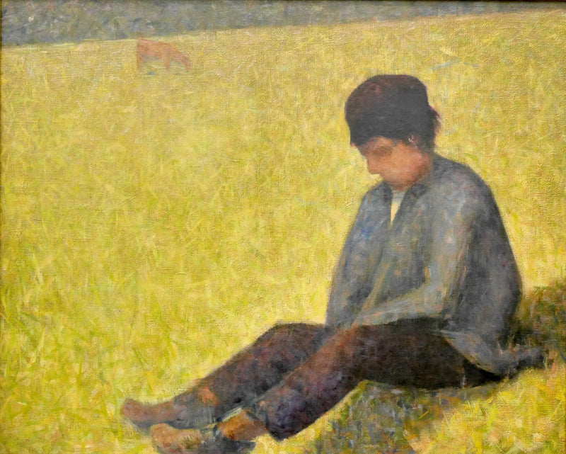 Poika istuu niityllä - Georges Seurat