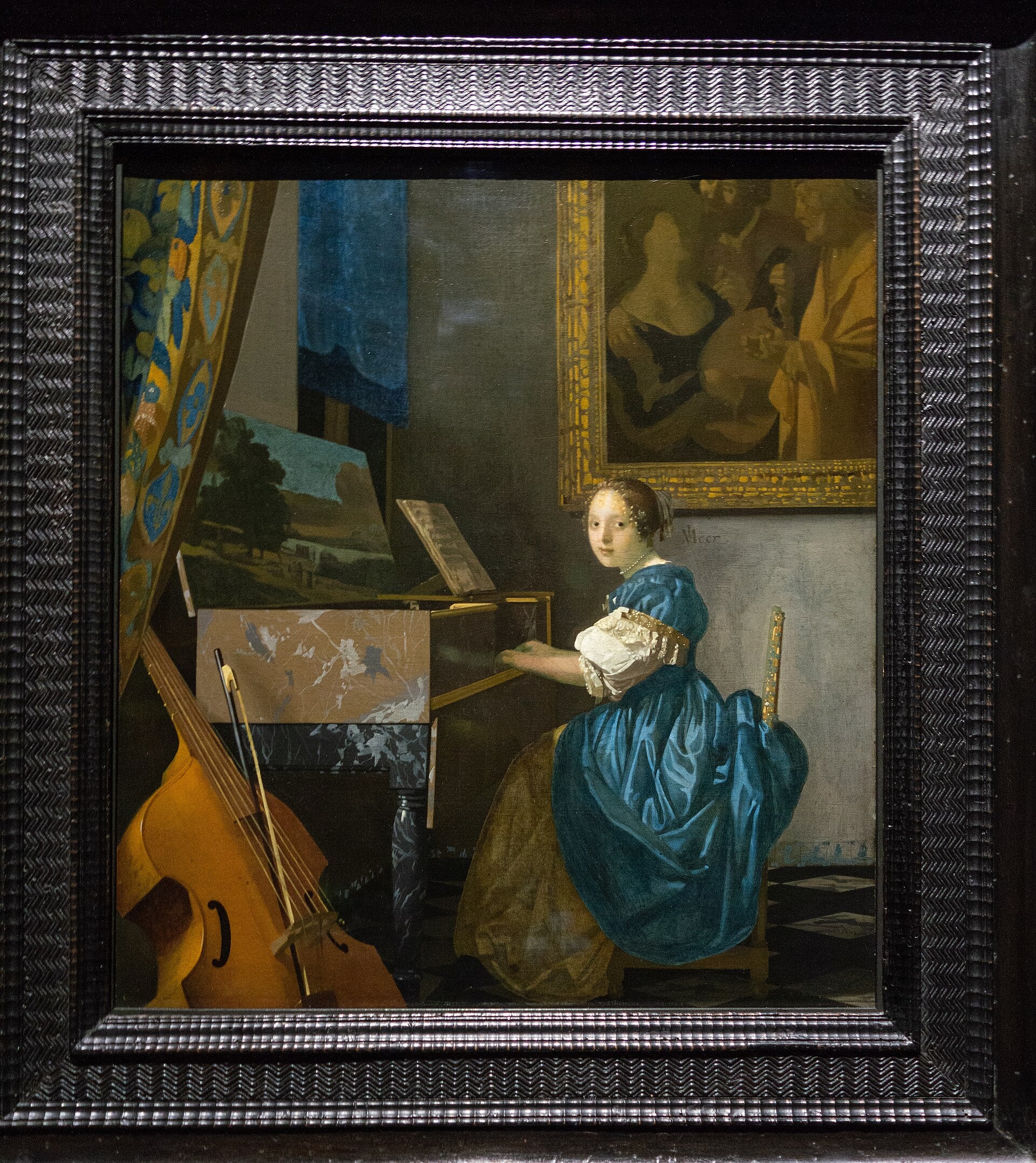 Nuori nainen soittamassa virginalia - Johannes Vermeer