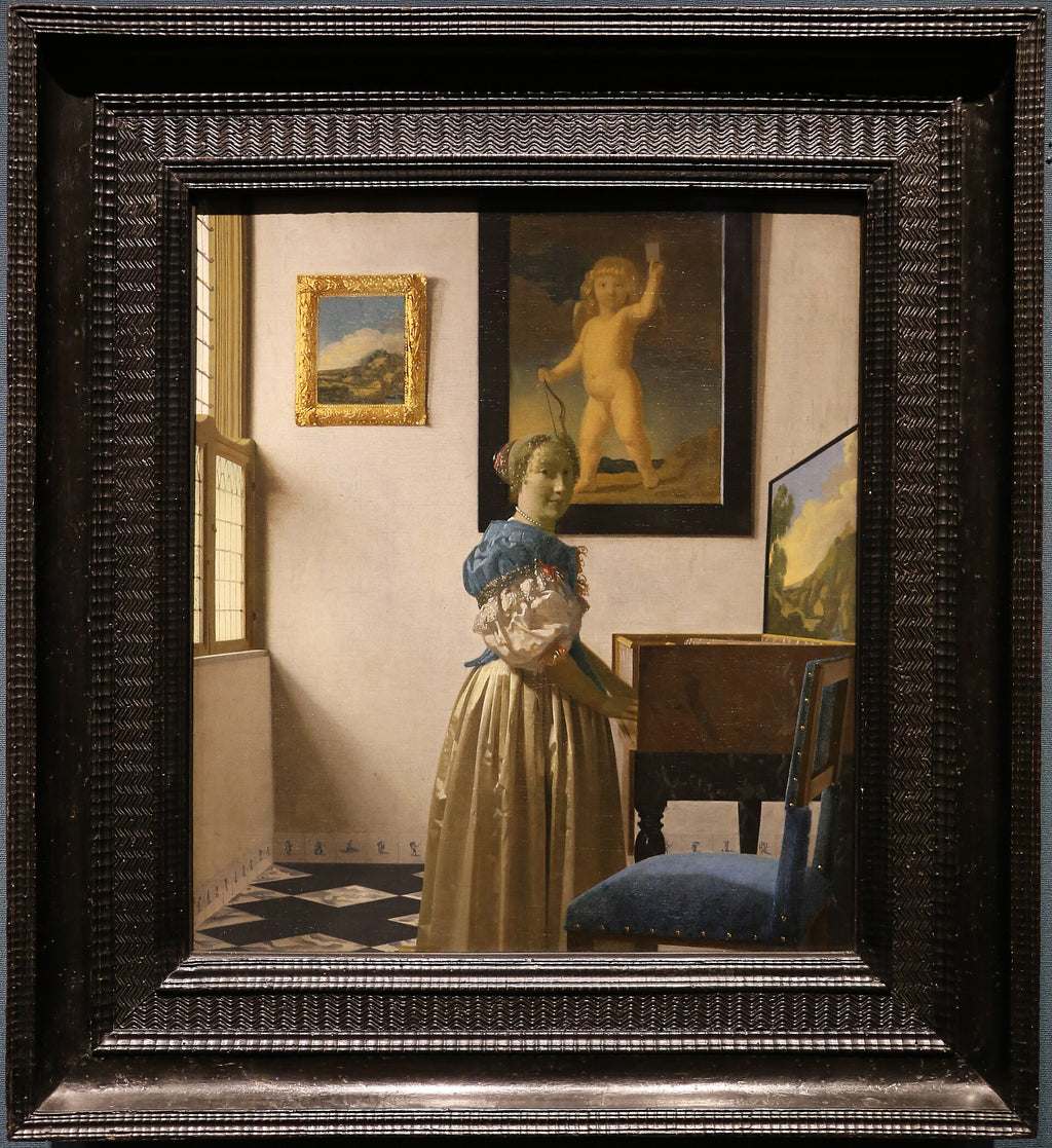 Nainen seisoo virginalin äärellä - Johannes Vermeer