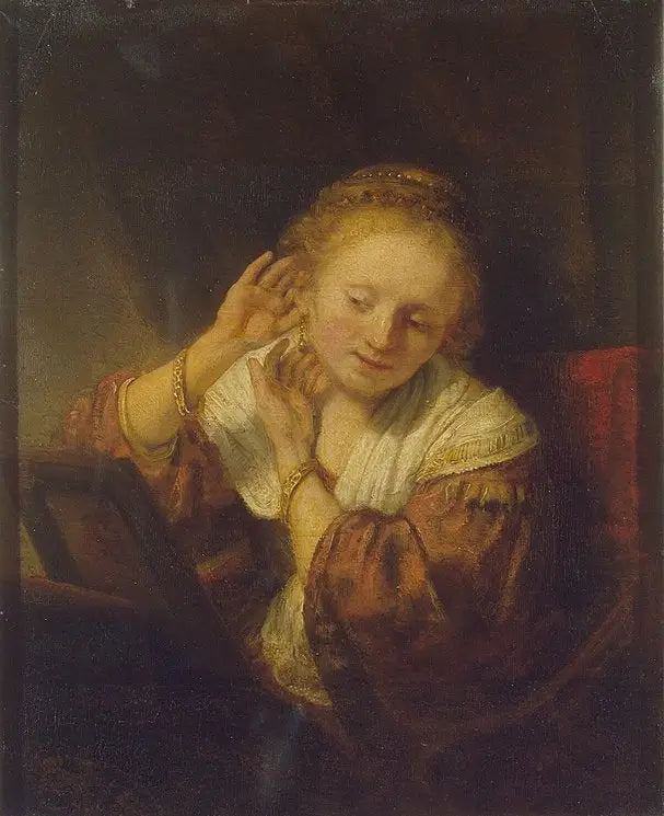 Korviksilla varustettu nuori tyttö - Rembrandt