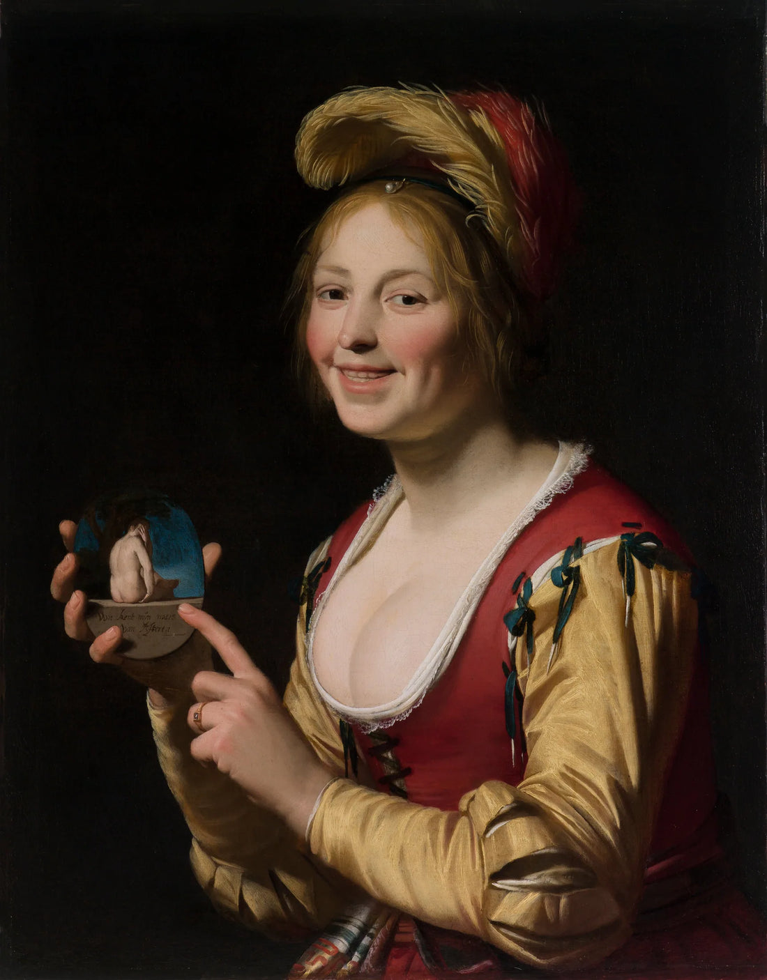 Nainen näyttämässä häiritsevää esinettä - Gerrit van Honthorst