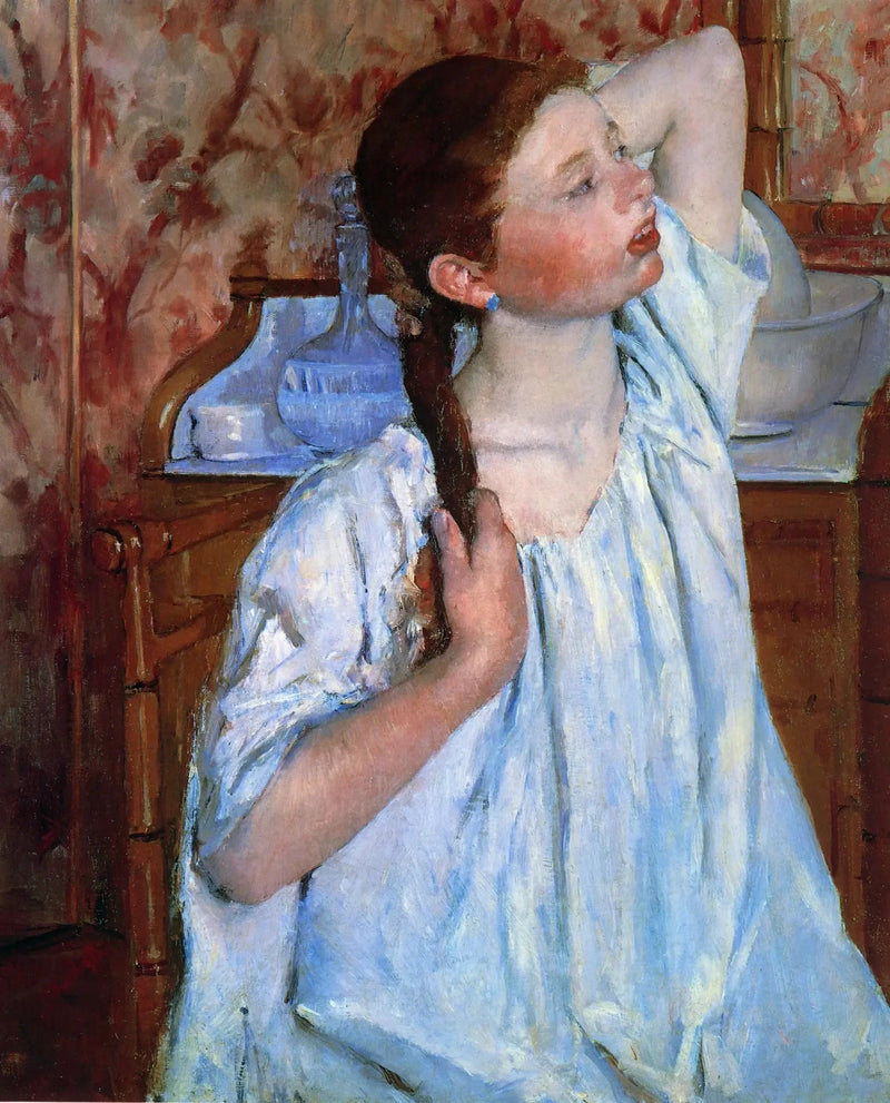 Tyttö, joka laittaa hiuksiaan - Mary Cassatt