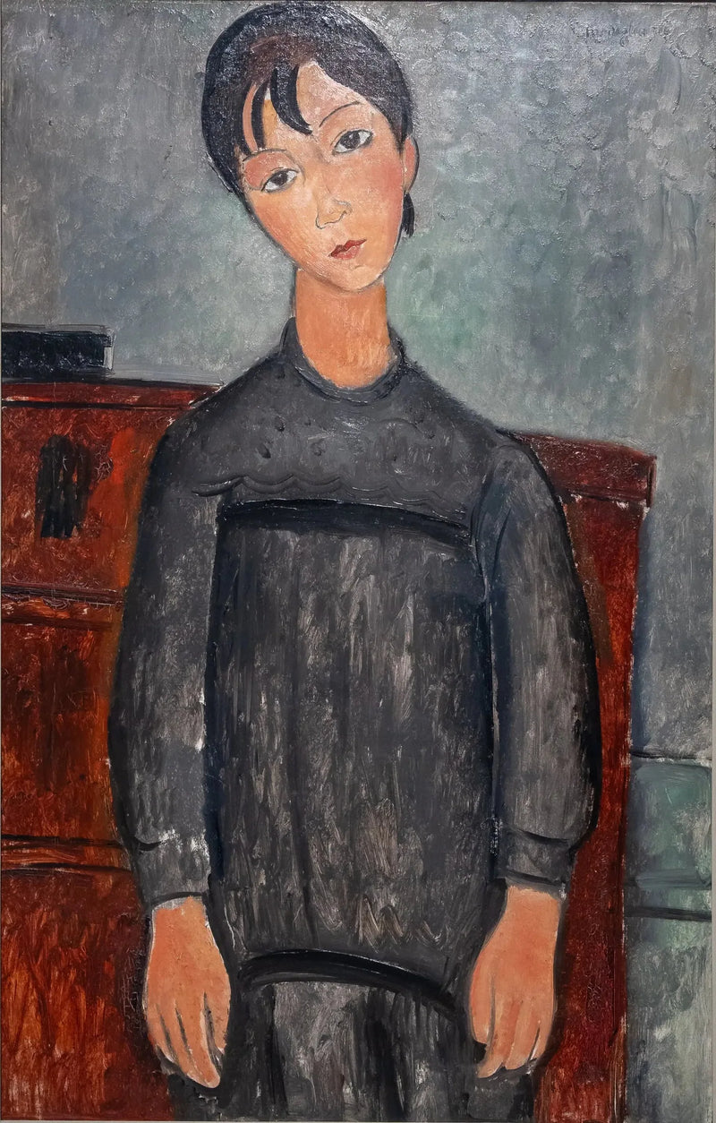 Mustassa esiliinassa seisova tyttö - Amedeo Modigliani
