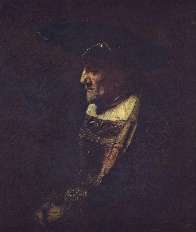 Mies koristeelliseen helmihattuun - Rembrandt