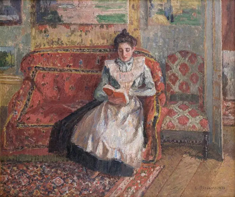 Jeanne Pissarro nimeltä Cocotte, lukemassa - Camille Pissarro