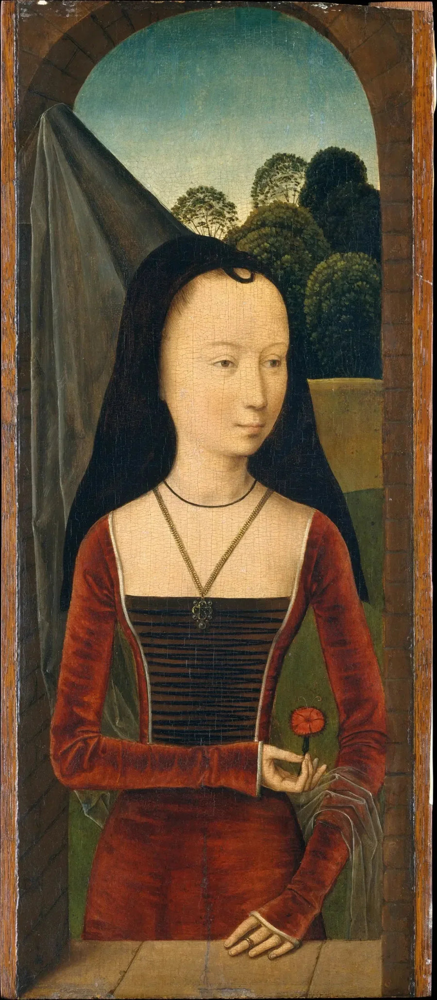 Nuori nainen ruusun kanssa - Hans Memling