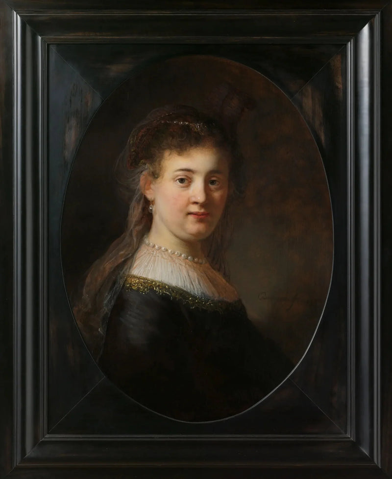 Nuori nainen fantastisessa puvussa - Rembrandt