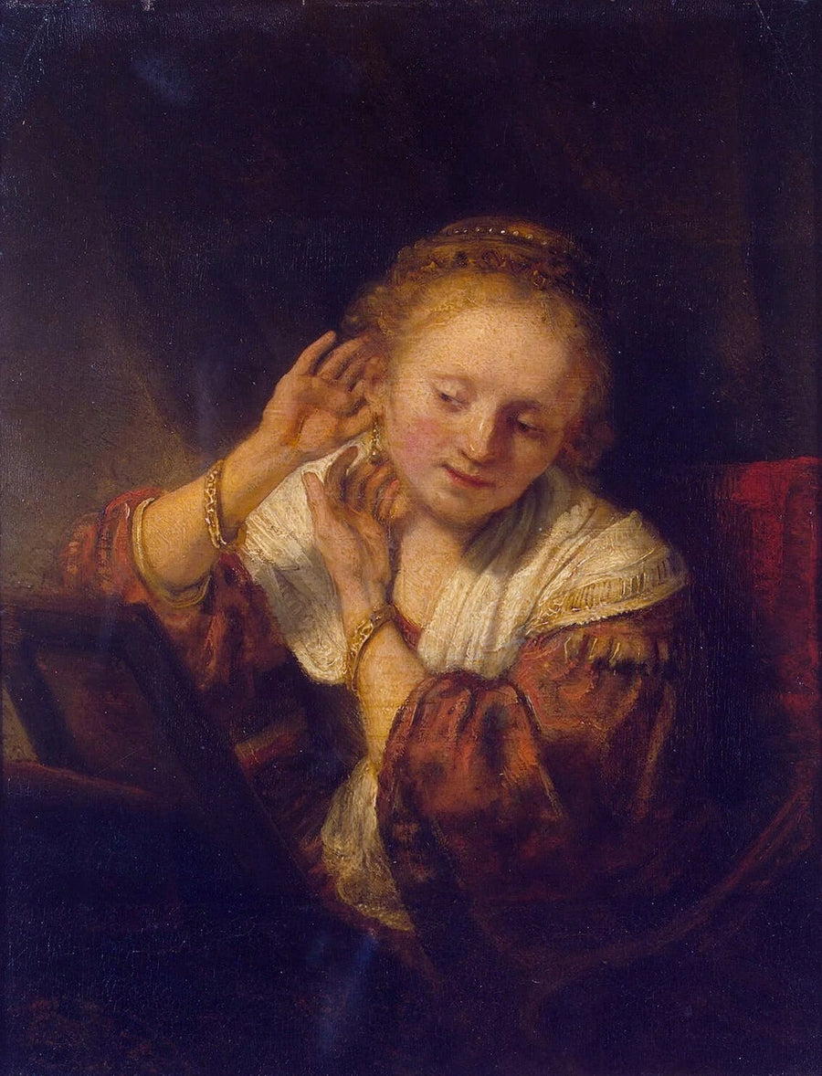 Korviksilla varustettu nuori tyttö - Rembrandt