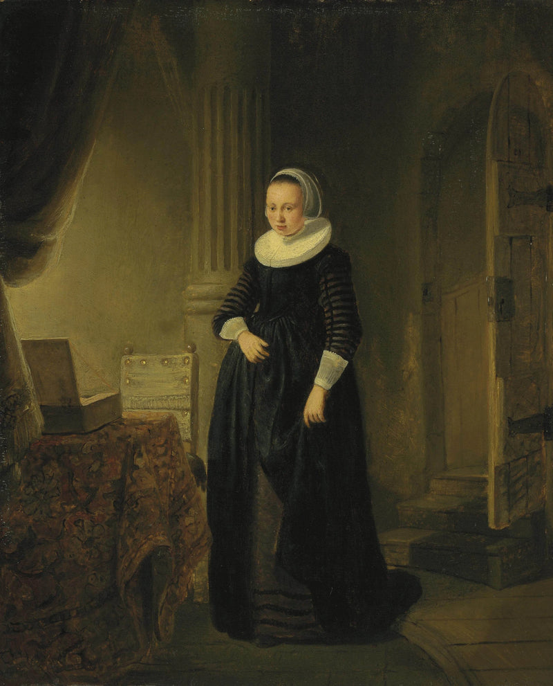 Naisen muotokuva, seisova täysikokoisena sisätilassa - Rembrandt