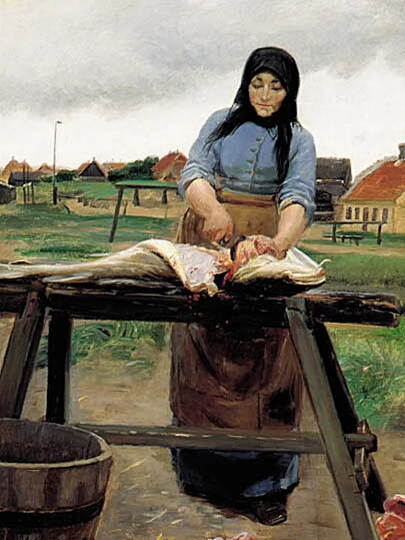Skagenilainen nainen leikkaa koljaa. - Michael Peter Ancher